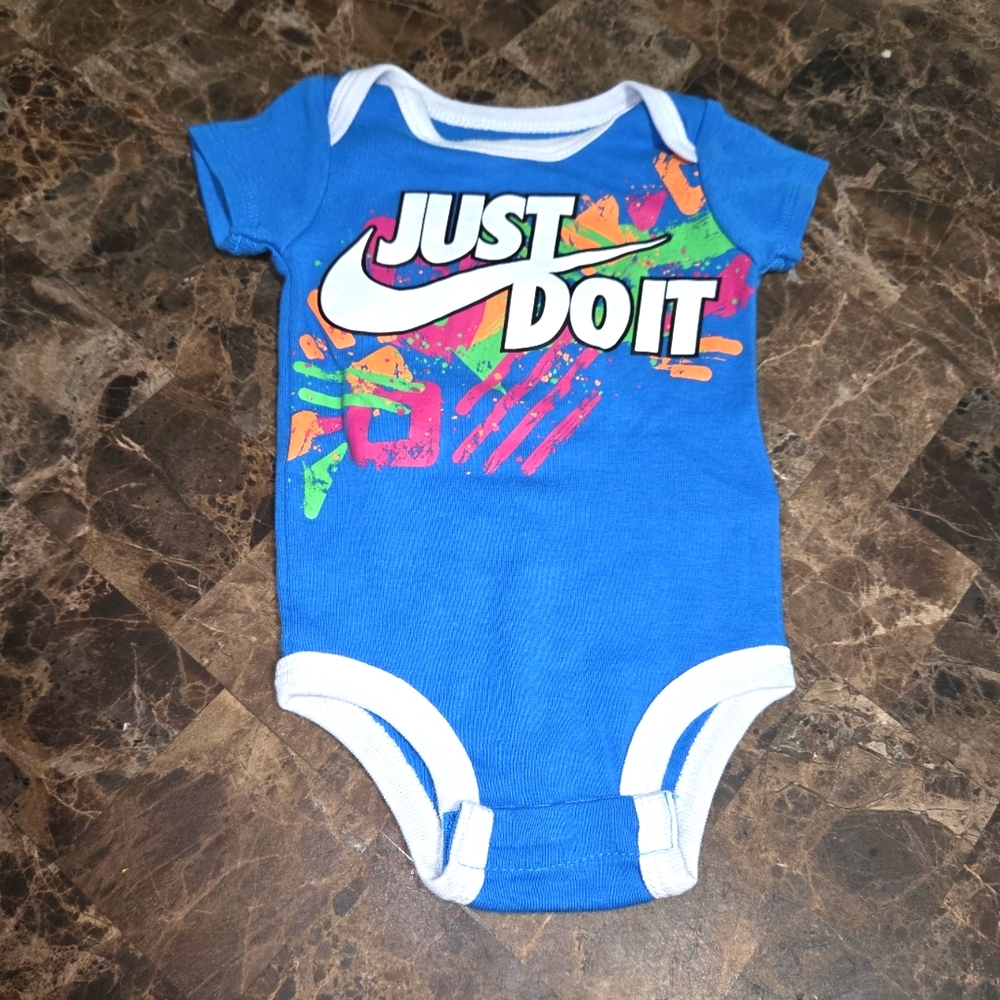 Nike baby Onesie Graffiti Blue. Size 0 To 6 months